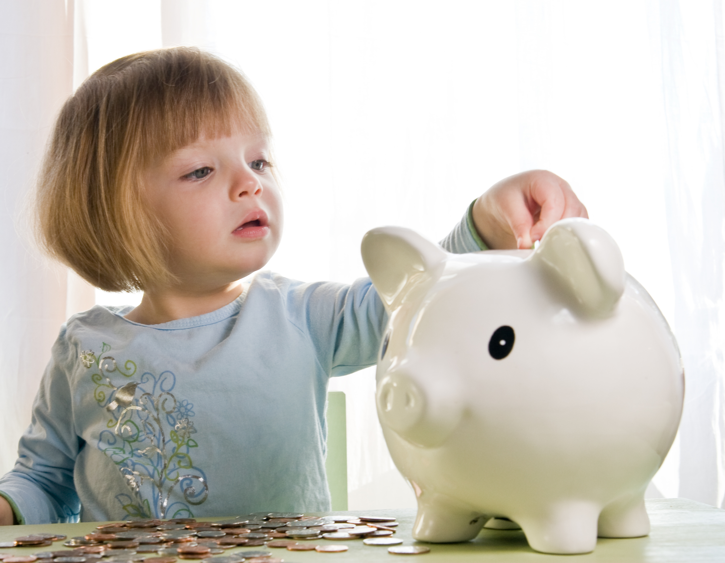 Girl piggy bank saving money