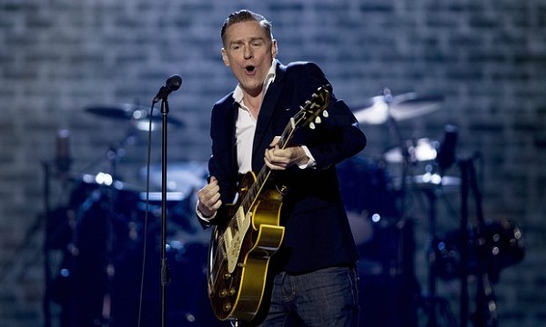 Bryan Adams performing on stage